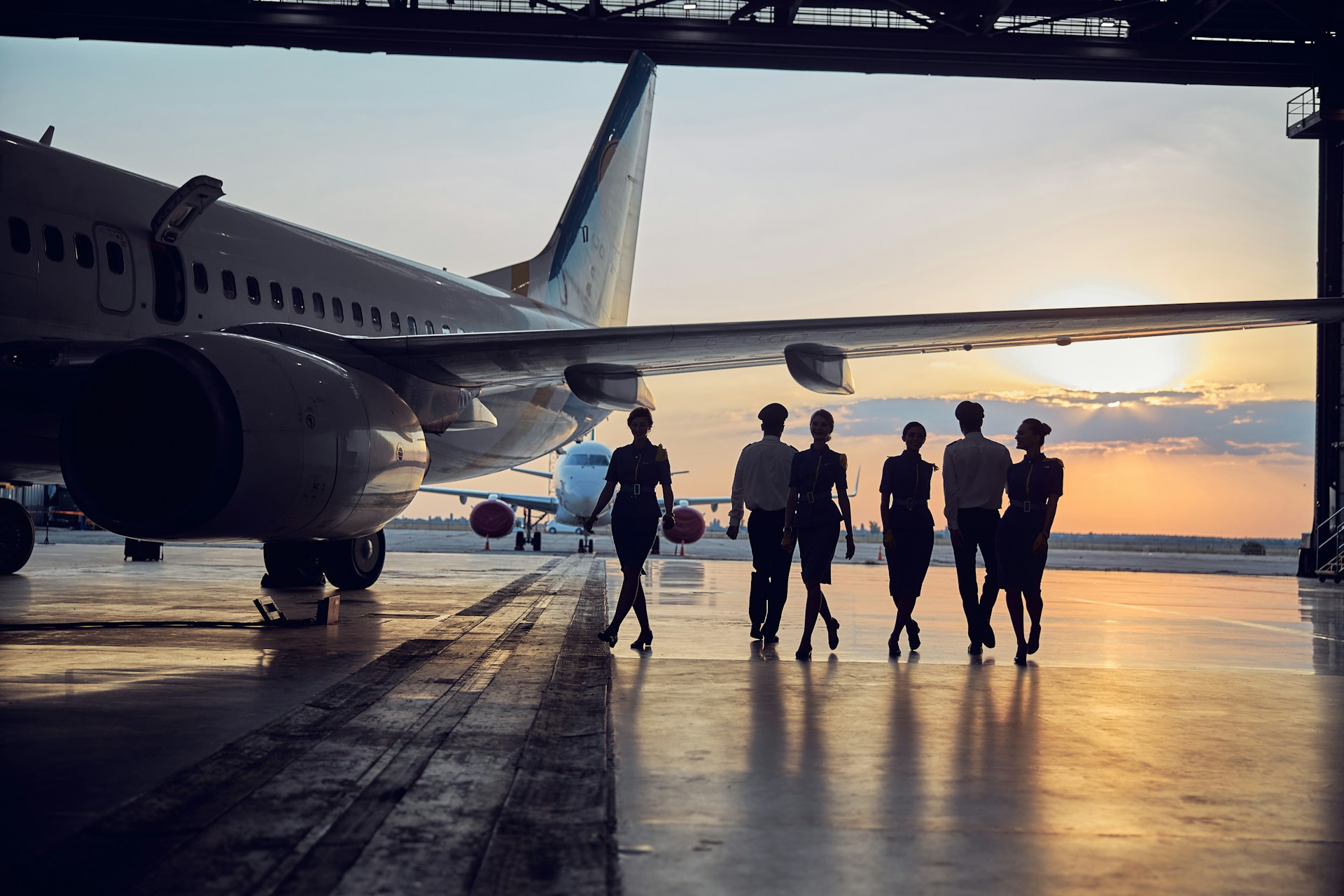 Photo of a flight crew waiting for you to board