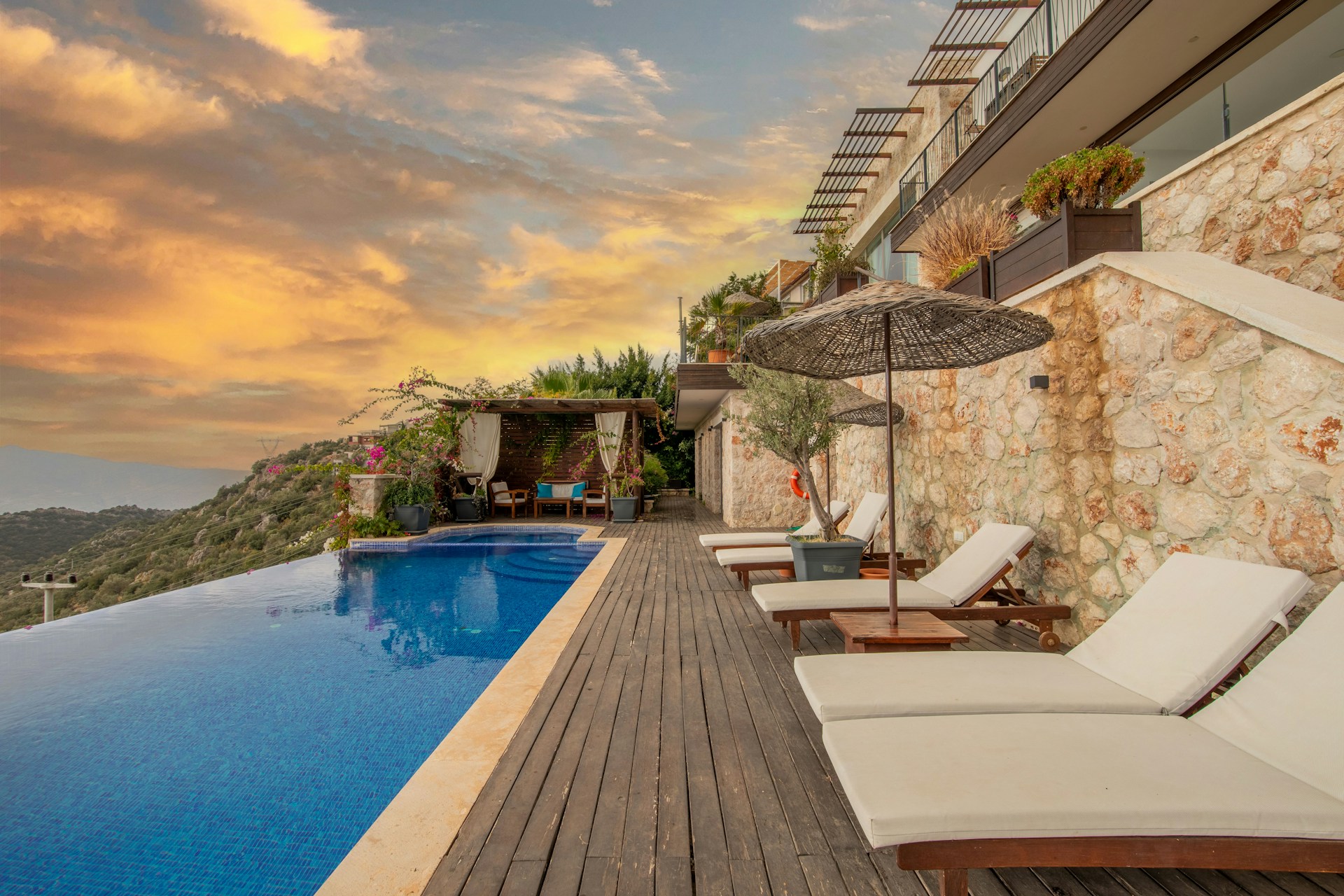 Photo of a cliffside villa with a pool