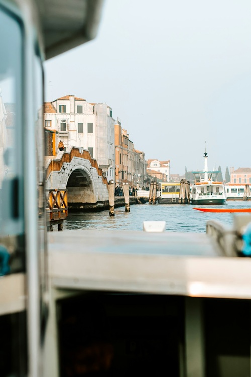 kateryna-hliznitsova-jaDDctIcCd8-unsplash Photo taken at the back of a boat leaving a European port.